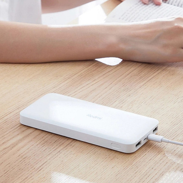 پاوربانک 10 وات شیائومی مدل Redmi ظرفیت 10000 میلی آمپر ساعت به همراه کابل تبدیل microUSB
